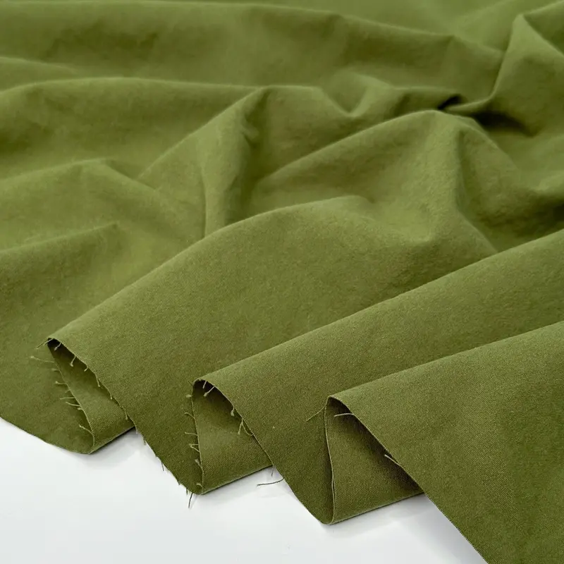 7Oz Pre-Washed Organic Cotton Canvas – Pesto Green Shade 1