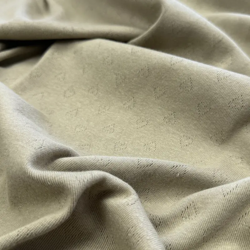 Organic Cotton Heart Motif Pointelle Knit Fabric In Pale Willow 1