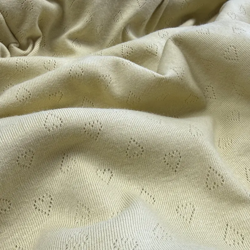 Organic Cotton Heart Motif Pointelle Knit Fabric In Warm Chamomile 1