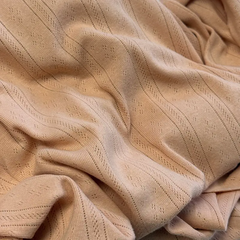 Organic Cotton Whispering Lines Pointelle Knit Fabric In Soft Apricot 1
