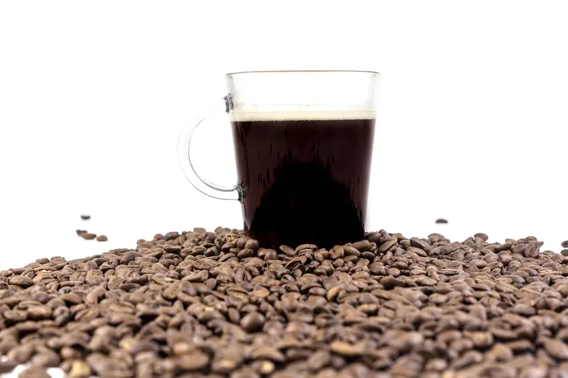 Steaming Coffee Cup With Fresh Coffee Beans 1
